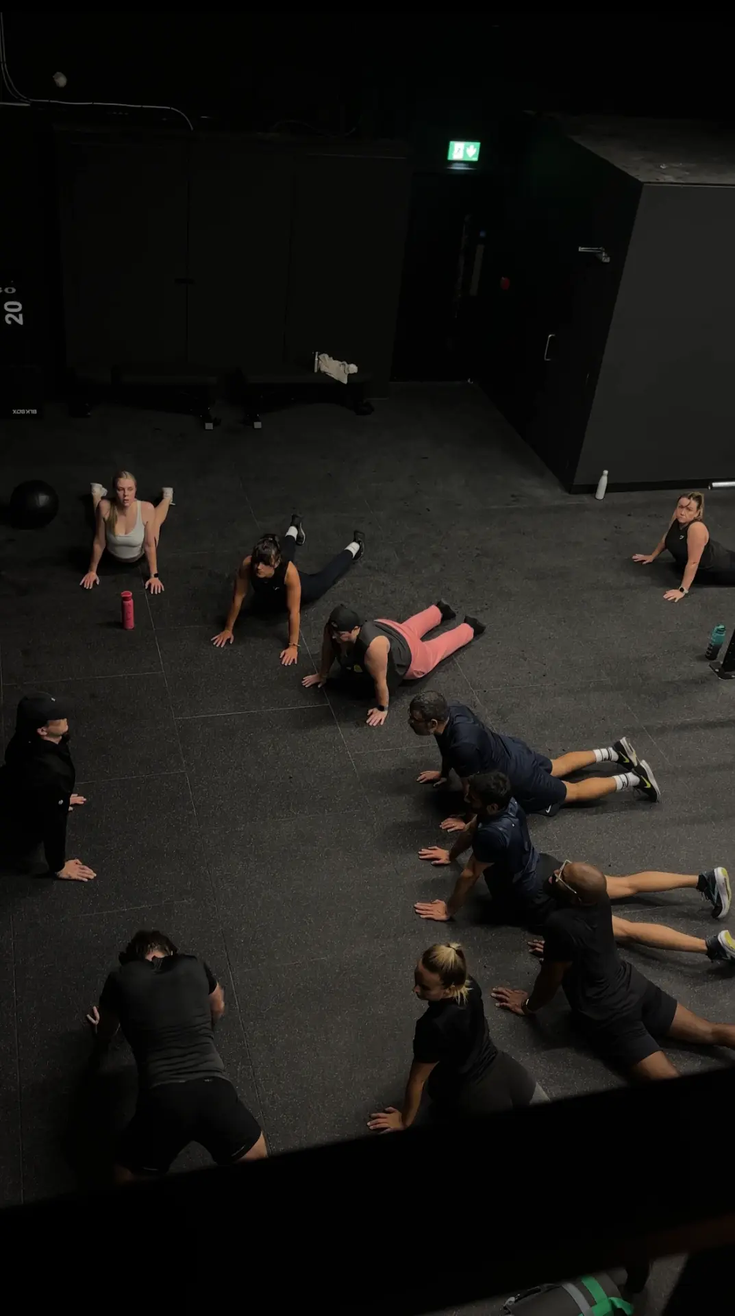 Members stretching together after training